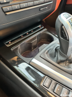 Empty cupholder close up.png