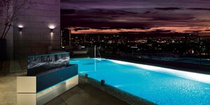 e-product-rollable-oled-tv-r1-luxury-lifestyle-3-w.jpg