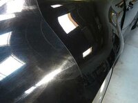 swirls-in-black-paint-911-rear-quarter-5050-detail.jpg