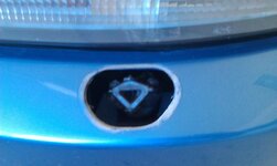 Headlightwasherlid.jpg