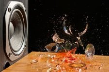 22099064-loud-music-can-cause-damage-studio-shot-of-glass-of-wine-exploding-in-front-of-a-loud...jpg